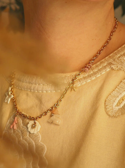 Collier coquillage en porcelaine - Vénus